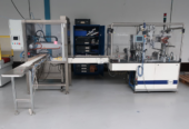 Sollas SX 60 film wrapping machine with moen maskinbyg pick and place feeder