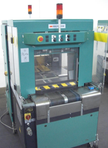 Signode Newsmaster 5500 cross strapping machines