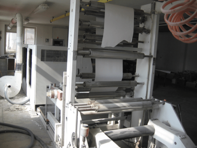 roll DIN A4 paper cutting line Bielomatik P 22-02 connected to a Wrapmatic paper wrapper